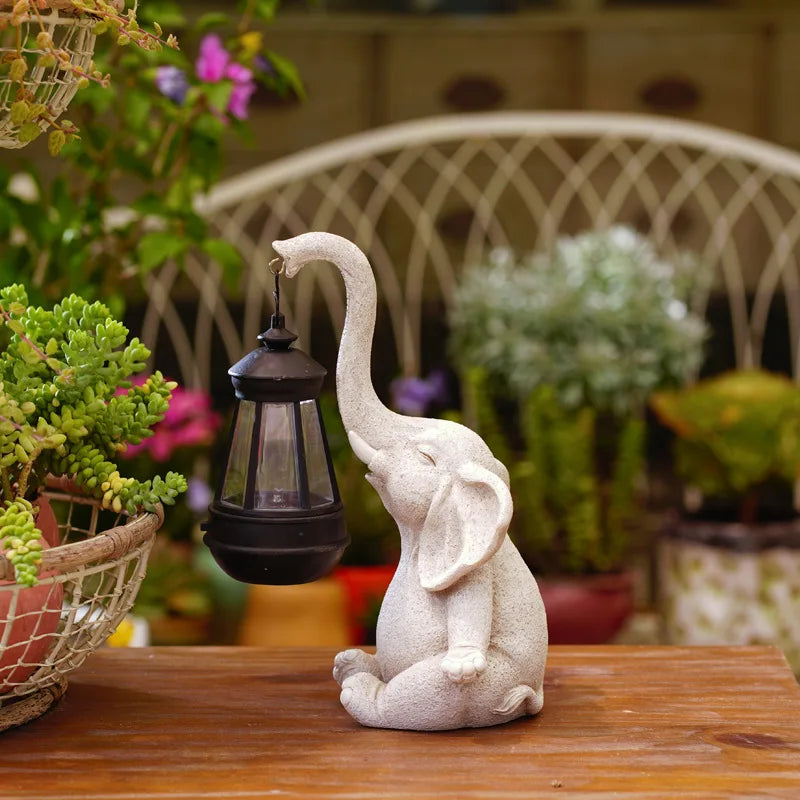 Solar Powered Elephant Holding Lamp